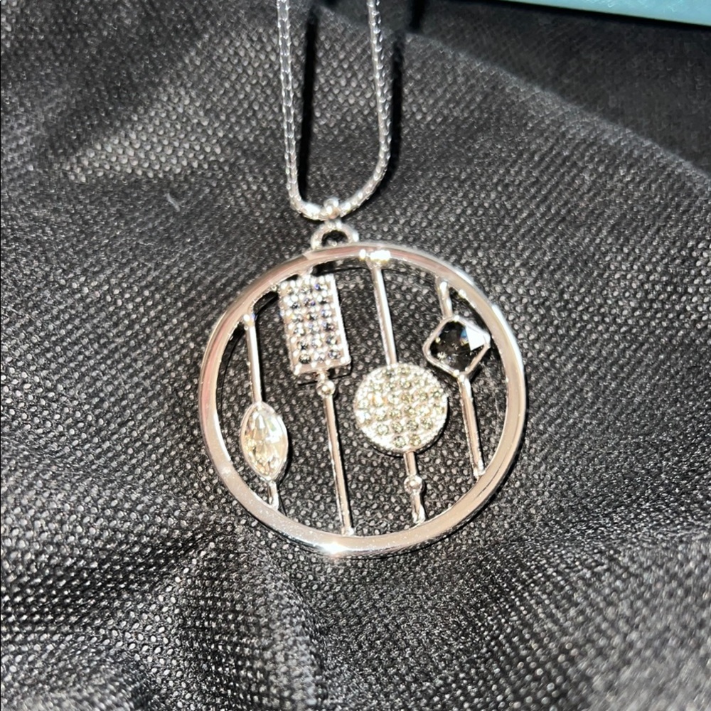 Touchstone Crystal Silver Musical Pendant Necklace